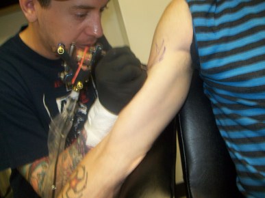 The outline getting laid down. Compared to previous tattoos, Josh had a very light hand. Nothing near bone-stabbing.